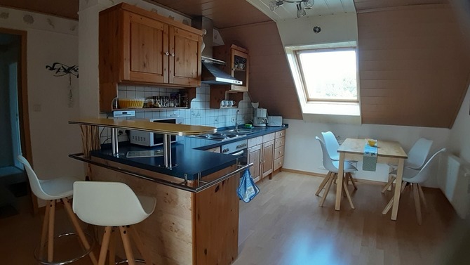 Ferienwohnung in L&uuml;tjenbrode - Residence Strandl&auml;ufer - Die Wohnk&uuml;che mit Bar und Tresen