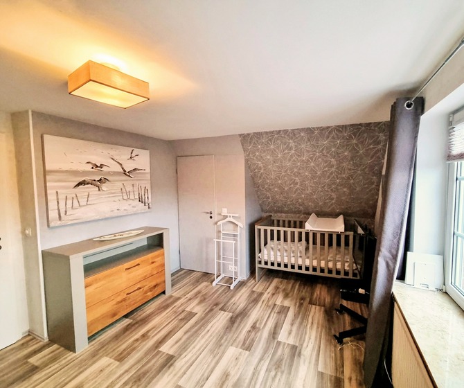 Ferienwohnung in Gr&ouml;mitz - Rosenstrasse 23 - Schlafzimmer 1 mit Zugang zum kleinen Bad